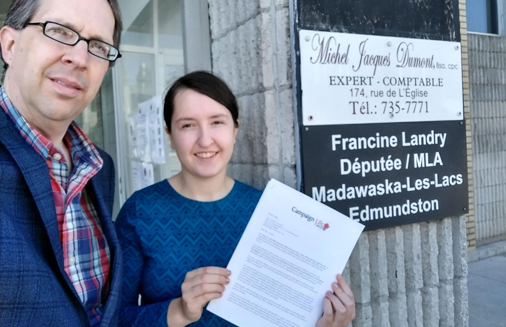 David Cooke delivers petition to office of Francine Landry